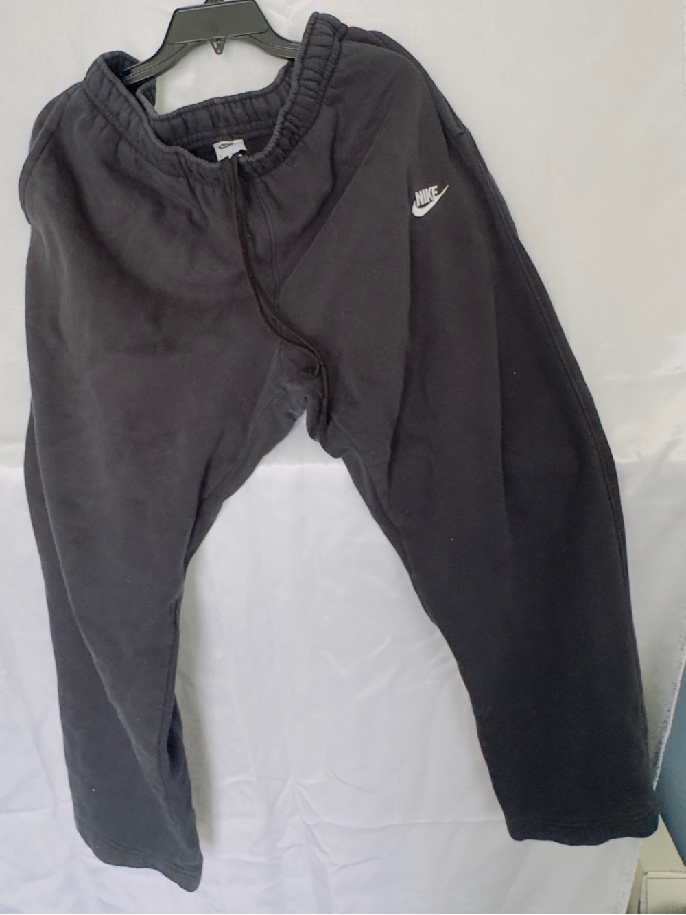 Nike men’s Black Jogger Sweatpants with White Swoosh